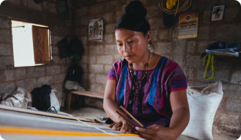 an Indigenous woman working